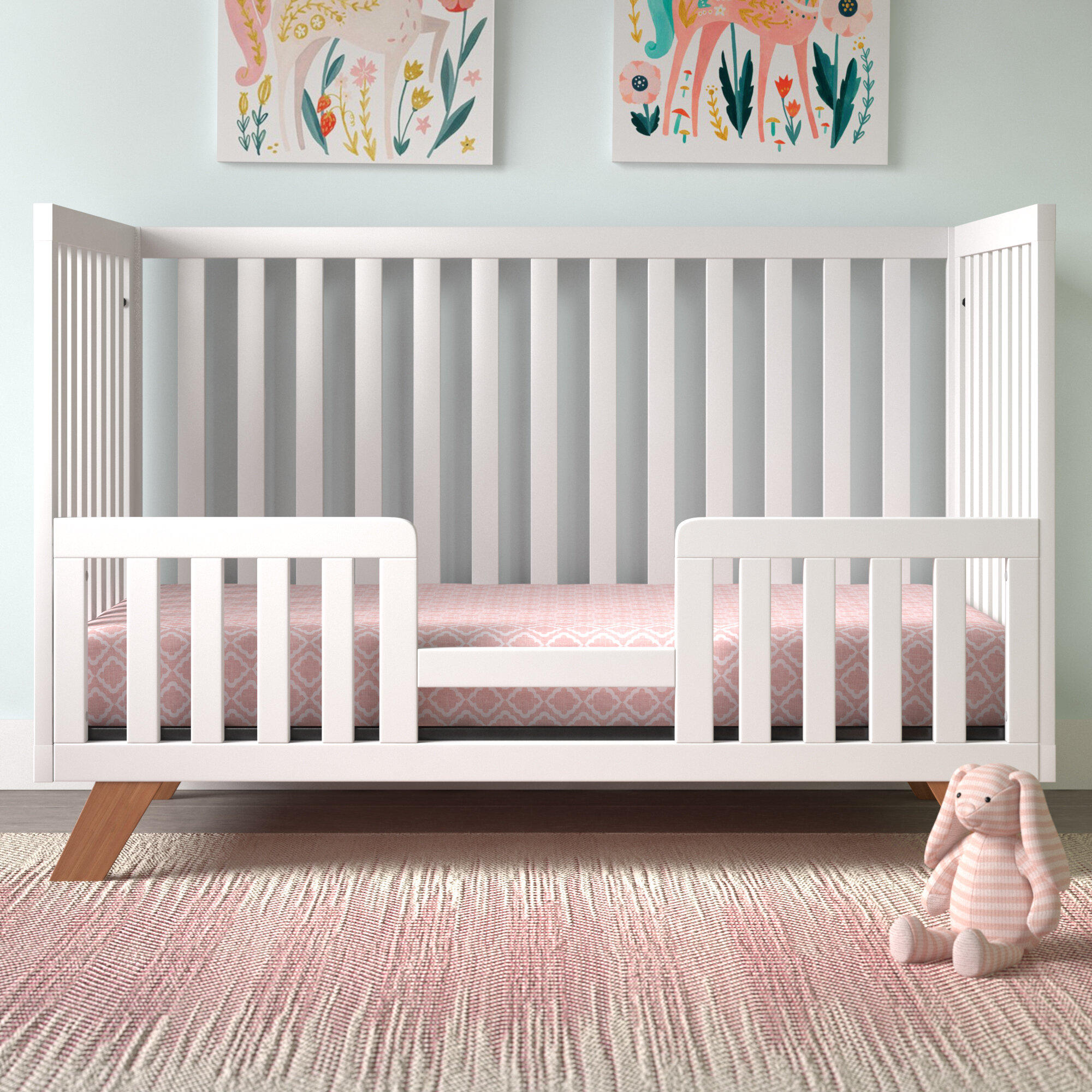 Crib outlet conversion rail